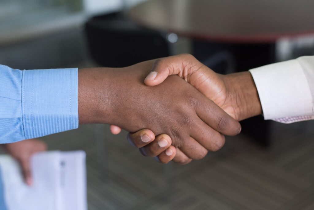 two person handshaking after a sales deal
Photo by Cytonn Photography on Unsplash