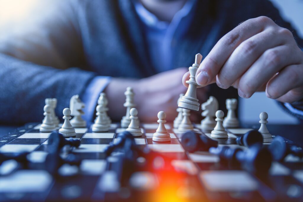 Deciphering business challenges like a chess board - Photo by JESHOOTS.COM on Unsplash