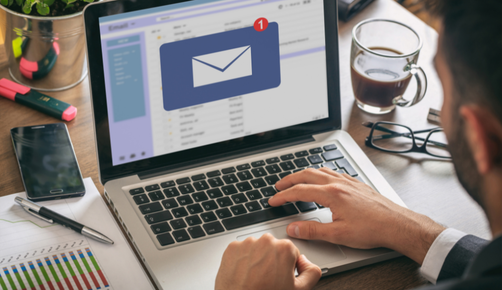 Checking email on laptop