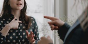 Pointing fingers in conflict